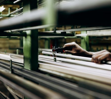 Steel material in different shapes on storage shelves